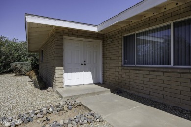 A rare gem right on the golf course!  With 4 bedrooms and 2.5 on Arizona City Golf Club in Arizona - for sale on GolfHomes.com, golf home, golf lot