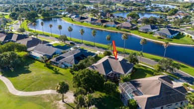 Overlooking the 10th green in the highly desired Viera East Golf on Viera East Golf Club in Florida - for sale on GolfHomes.com, golf home, golf lot