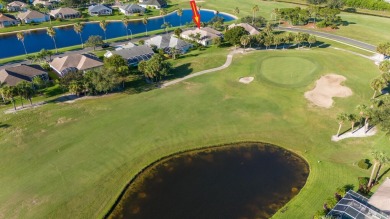 Overlooking the 10th green in the highly desired Viera East Golf on Viera East Golf Club in Florida - for sale on GolfHomes.com, golf home, golf lot