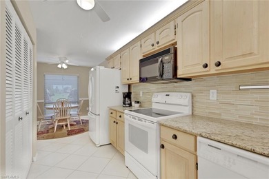 This well-appointed first-floor condo has stunning lake views on Riviera Golf Club in Florida - for sale on GolfHomes.com, golf home, golf lot