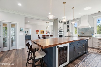 Set on a rare 1.98-acre peninsula at the convergence of the on Sound Golf Links at Albemarle Plantation in North Carolina - for sale on GolfHomes.com, golf home, golf lot