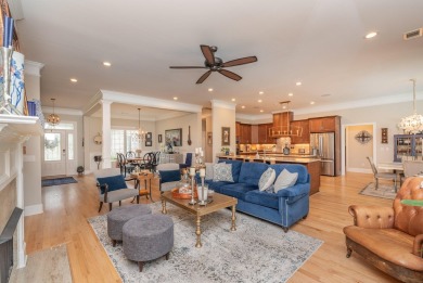This luxurious residence features an open-concept floor plan on The Golf Club At Cedar Creek in South Carolina - for sale on GolfHomes.com, golf home, golf lot