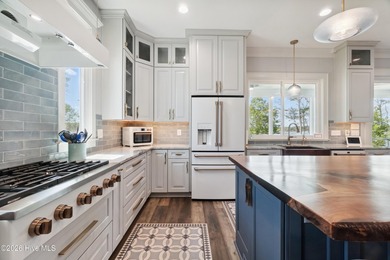 Set on a rare 1.98-acre peninsula at the convergence of the on Sound Golf Links at Albemarle Plantation in North Carolina - for sale on GolfHomes.com, golf home, golf lot