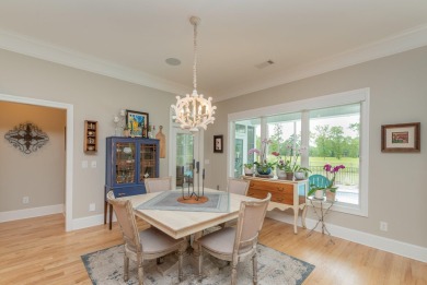 This luxurious residence features an open-concept floor plan on The Golf Club At Cedar Creek in South Carolina - for sale on GolfHomes.com, golf home, golf lot