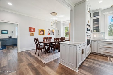 Set on a rare 1.98-acre peninsula at the convergence of the on Sound Golf Links at Albemarle Plantation in North Carolina - for sale on GolfHomes.com, golf home, golf lot