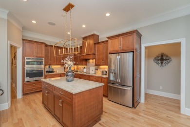 This luxurious residence features an open-concept floor plan on The Golf Club At Cedar Creek in South Carolina - for sale on GolfHomes.com, golf home, golf lot