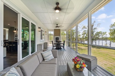 Set on a rare 1.98-acre peninsula at the convergence of the on Sound Golf Links at Albemarle Plantation in North Carolina - for sale on GolfHomes.com, golf home, golf lot