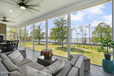 Set on a rare 1.98-acre peninsula at the convergence of the on Sound Golf Links at Albemarle Plantation in North Carolina - for sale on GolfHomes.com, golf home, golf lot