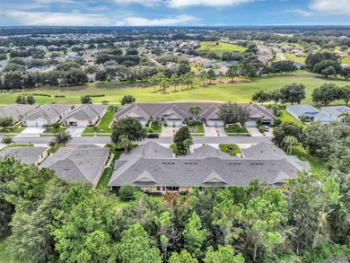 This 2 bedroom, 2 bath concrete block & stucco villa with on Arlington Ridge Golf Club in Florida - for sale on GolfHomes.com, golf home, golf lot