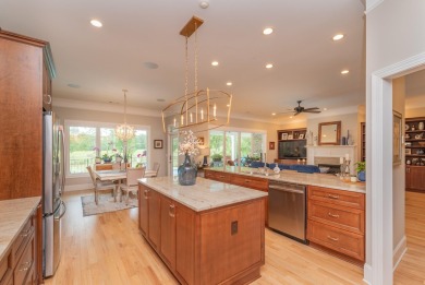 This luxurious residence features an open-concept floor plan on The Golf Club At Cedar Creek in South Carolina - for sale on GolfHomes.com, golf home, golf lot