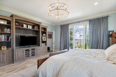 Set on a rare 1.98-acre peninsula at the convergence of the on Sound Golf Links at Albemarle Plantation in North Carolina - for sale on GolfHomes.com, golf home, golf lot