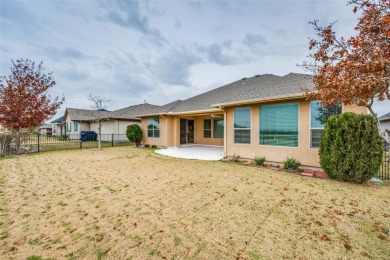The three bedroom home offers versatile space that can be on Wildhorse Golf Club of Robson Ranch in Texas - for sale on GolfHomes.com, golf home, golf lot