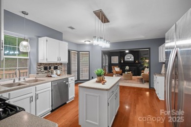 Nestled in the sought-after Highland Creek golf course community on Highland Creek Golf Club in North Carolina - for sale on GolfHomes.com, golf home, golf lot