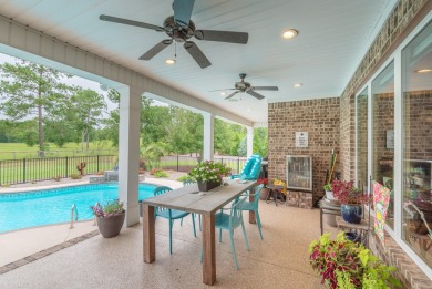 This luxurious residence features an open-concept floor plan on The Golf Club At Cedar Creek in South Carolina - for sale on GolfHomes.com, golf home, golf lot