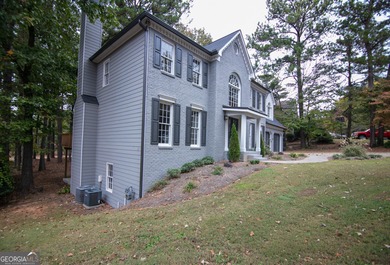 Renovations are complete! This huge home comes complete with a on Brookstone Golf and Country Club in Georgia - for sale on GolfHomes.com, golf home, golf lot