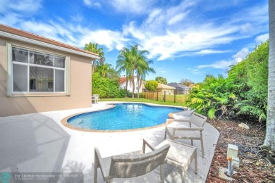 Don't miss out on this move-in ready Weston Hills home! Located on Weston Hills Country Club in Florida - for sale on GolfHomes.com, golf home, golf lot