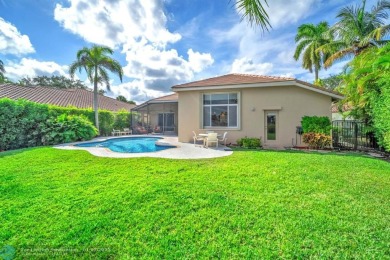 Don't miss out on this move-in ready Weston Hills home! Located on Weston Hills Country Club in Florida - for sale on GolfHomes.com, golf home, golf lot