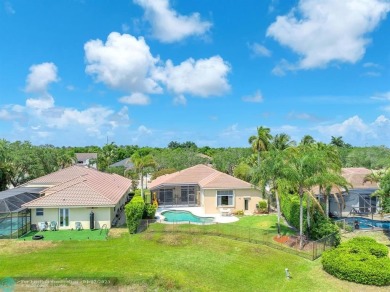 Don't miss out on this move-in ready Weston Hills home! Located on Weston Hills Country Club in Florida - for sale on GolfHomes.com, golf home, golf lot