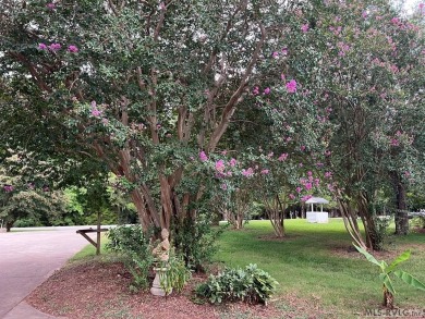 Reasonably priced Lake Gaston home with launch ramp behind the on Myrick Hills Country Club in North Carolina - for sale on GolfHomes.com, golf home, golf lot