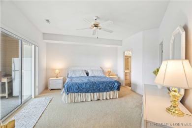 End unit at Bristol Bay with breathtaking lake views and a 12x30 on Seasons Ridge At Four Seasons in Missouri - for sale on GolfHomes.com, golf home, golf lot