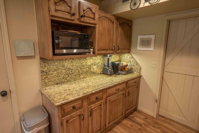 Discover your perfect retreat in this inviting, move-in ready on The Coves Golf Course in Oklahoma - for sale on GolfHomes.com, golf home, golf lot