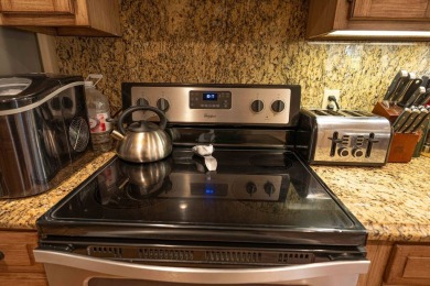 Discover your perfect retreat in this inviting, move-in ready on The Coves Golf Course in Oklahoma - for sale on GolfHomes.com, golf home, golf lot