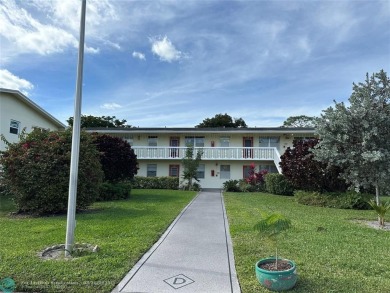 UNIT WITH NEW AIR CONDITIONING, NEW WATER HEATER, NEW FRENCH on Hillsboro Pines Golf in Florida - for sale on GolfHomes.com, golf home, golf lot