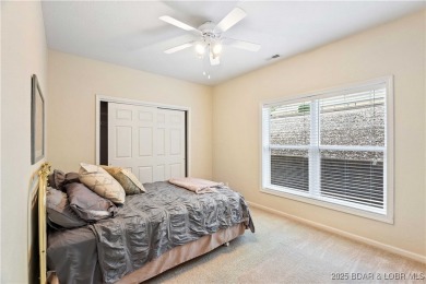 End unit at Bristol Bay with breathtaking lake views and a 12x30 on Seasons Ridge At Four Seasons in Missouri - for sale on GolfHomes.com, golf home, golf lot