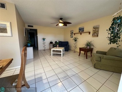UNIT WITH NEW AIR CONDITIONING, NEW WATER HEATER, NEW FRENCH on Hillsboro Pines Golf in Florida - for sale on GolfHomes.com, golf home, golf lot