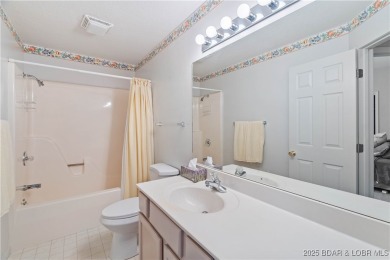 End unit at Bristol Bay with breathtaking lake views and a 12x30 on Seasons Ridge At Four Seasons in Missouri - for sale on GolfHomes.com, golf home, golf lot