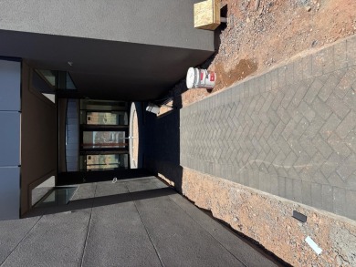 With sweeping views and detailed attention to architecture and on Entrada at Snow Canyon in Utah - for sale on GolfHomes.com, golf home, golf lot