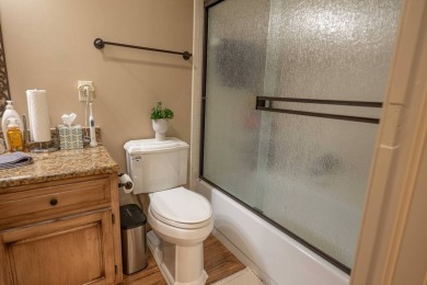 Discover your perfect retreat in this inviting, move-in ready on The Coves Golf Course in Oklahoma - for sale on GolfHomes.com, golf home, golf lot