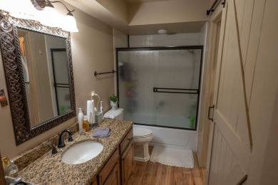 Discover your perfect retreat in this inviting, move-in ready on The Coves Golf Course in Oklahoma - for sale on GolfHomes.com, golf home, golf lot