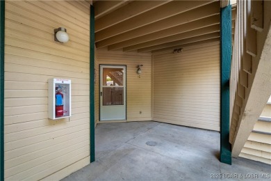 End unit at Bristol Bay with breathtaking lake views and a 12x30 on Seasons Ridge At Four Seasons in Missouri - for sale on GolfHomes.com, golf home, golf lot