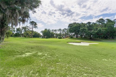 This home comes with the included breathtaking golf course views on Harbor Hills Country Club in Florida - for sale on GolfHomes.com, golf home, golf lot
