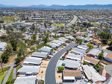 38587 Via Amarilla is a beautiful upgraded manufactured home on The Golf Club At Rancho California in California - for sale on GolfHomes.com, golf home, golf lot