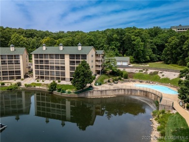 End unit at Bristol Bay with breathtaking lake views and a 12x30 on Seasons Ridge At Four Seasons in Missouri - for sale on GolfHomes.com, golf home, golf lot