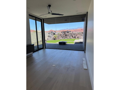 With sweeping views and detailed attention to architecture and on Entrada at Snow Canyon in Utah - for sale on GolfHomes.com, golf home, golf lot
