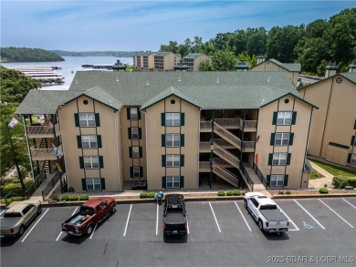End unit at Bristol Bay with breathtaking lake views and a 12x30 on Seasons Ridge At Four Seasons in Missouri - for sale on GolfHomes.com, golf home, golf lot