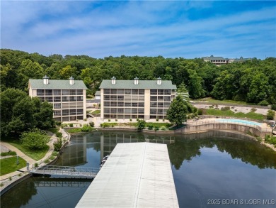 End unit at Bristol Bay with breathtaking lake views and a 12x30 on Seasons Ridge At Four Seasons in Missouri - for sale on GolfHomes.com, golf home, golf lot
