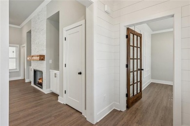 Nestled in the prestigious gated community of The Orchard in on The Orchard Golf and Country Club in Georgia - for sale on GolfHomes.com, golf home, golf lot