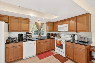 Wake up to sweeping golf course views in this bright, breezy on East Bay Golf Club in Florida - for sale on GolfHomes.com, golf home, golf lot