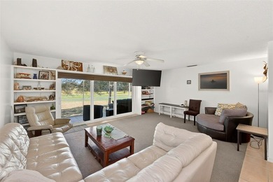 Wake up to sweeping golf course views in this bright, breezy on East Bay Golf Club in Florida - for sale on GolfHomes.com, golf home, golf lot