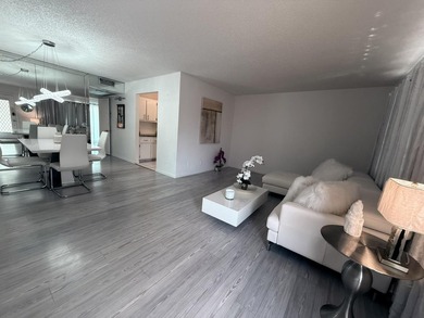 Step into this totally renovated 1-bedroom, 1-bathroom condo and on Flamingo Lakes Country Club in Florida - for sale on GolfHomes.com, golf home, golf lot