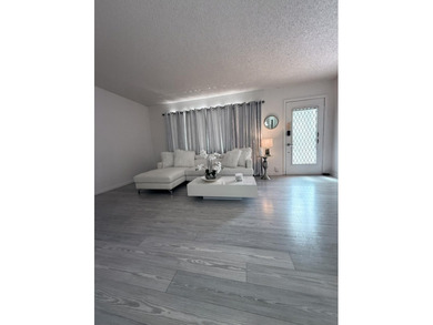 Step into this totally renovated 1-bedroom, 1-bathroom condo and on Flamingo Lakes Country Club in Florida - for sale on GolfHomes.com, golf home, golf lot