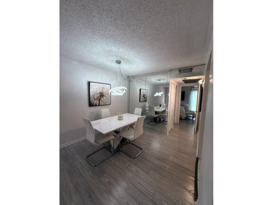Step into this totally renovated 1-bedroom, 1-bathroom condo and on Flamingo Lakes Country Club in Florida - for sale on GolfHomes.com, golf home, golf lot