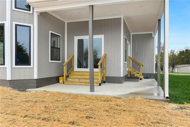 Looking for a high-quality lake home? Come see this newly on Linn Valley Lakes - Deer Trace Golf Course in Kansas - for sale on GolfHomes.com, golf home, golf lot