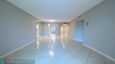 Embrace the vibrant 55+ lifestyle in South Florida's best-kept on Wynmoor Golf Course in Florida - for sale on GolfHomes.com, golf home, golf lot