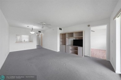 Top-floor 2BD/2BA condo in Sunrise Lakes Phase 4, a 55+ on Sunrise Lakes Phase IV Golf Course in Florida - for sale on GolfHomes.com, golf home, golf lot