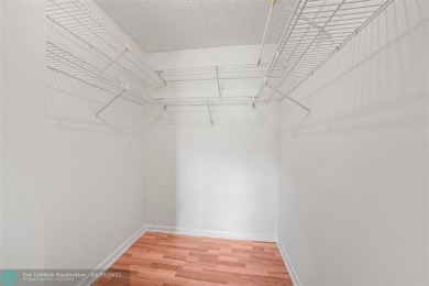 Top-floor 2BD/2BA condo in Sunrise Lakes Phase 4, a 55+ on Sunrise Lakes Phase IV Golf Course in Florida - for sale on GolfHomes.com, golf home, golf lot